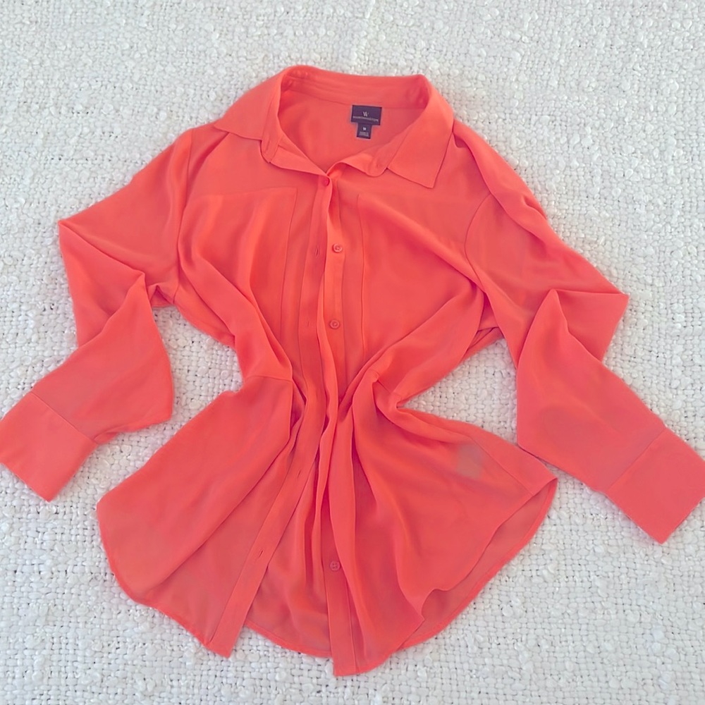 Thin, super chic orange button up. Can be tied or worn over shirt